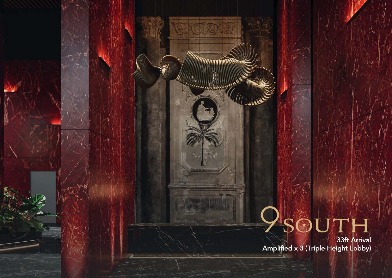 9 South foyer with red marble walls and sculptural brass chandelier
